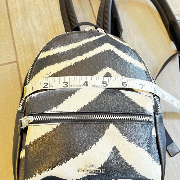 Coach Zebra MN CHRLE 39033 SV/BLACK
Coach Mini Charlie Women's Zebra Print EC - Picture 5 of 16